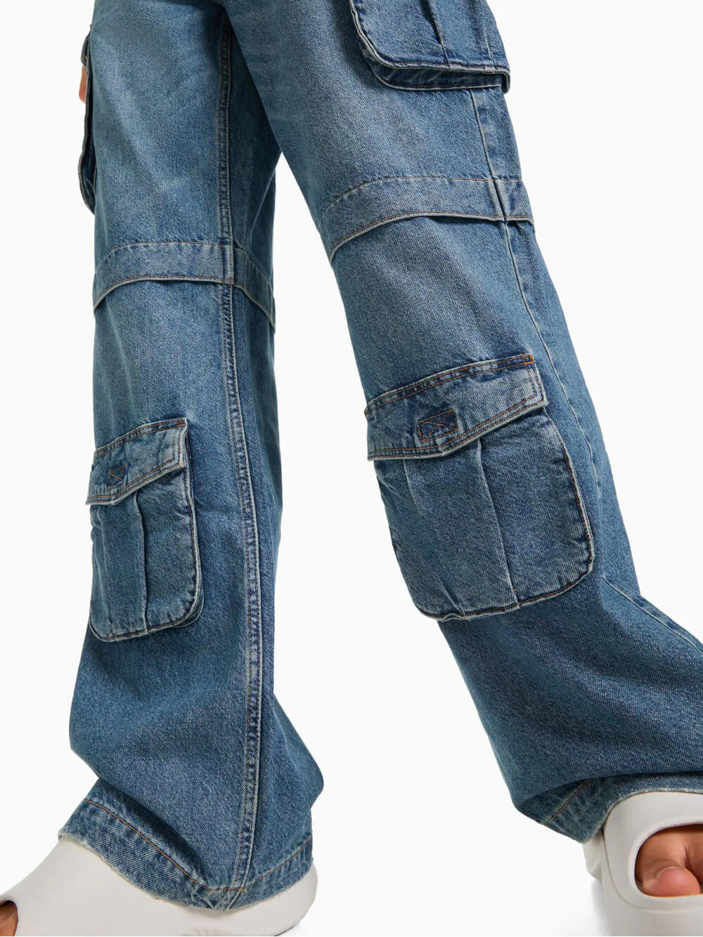 Jeans cargo multi-tasca
