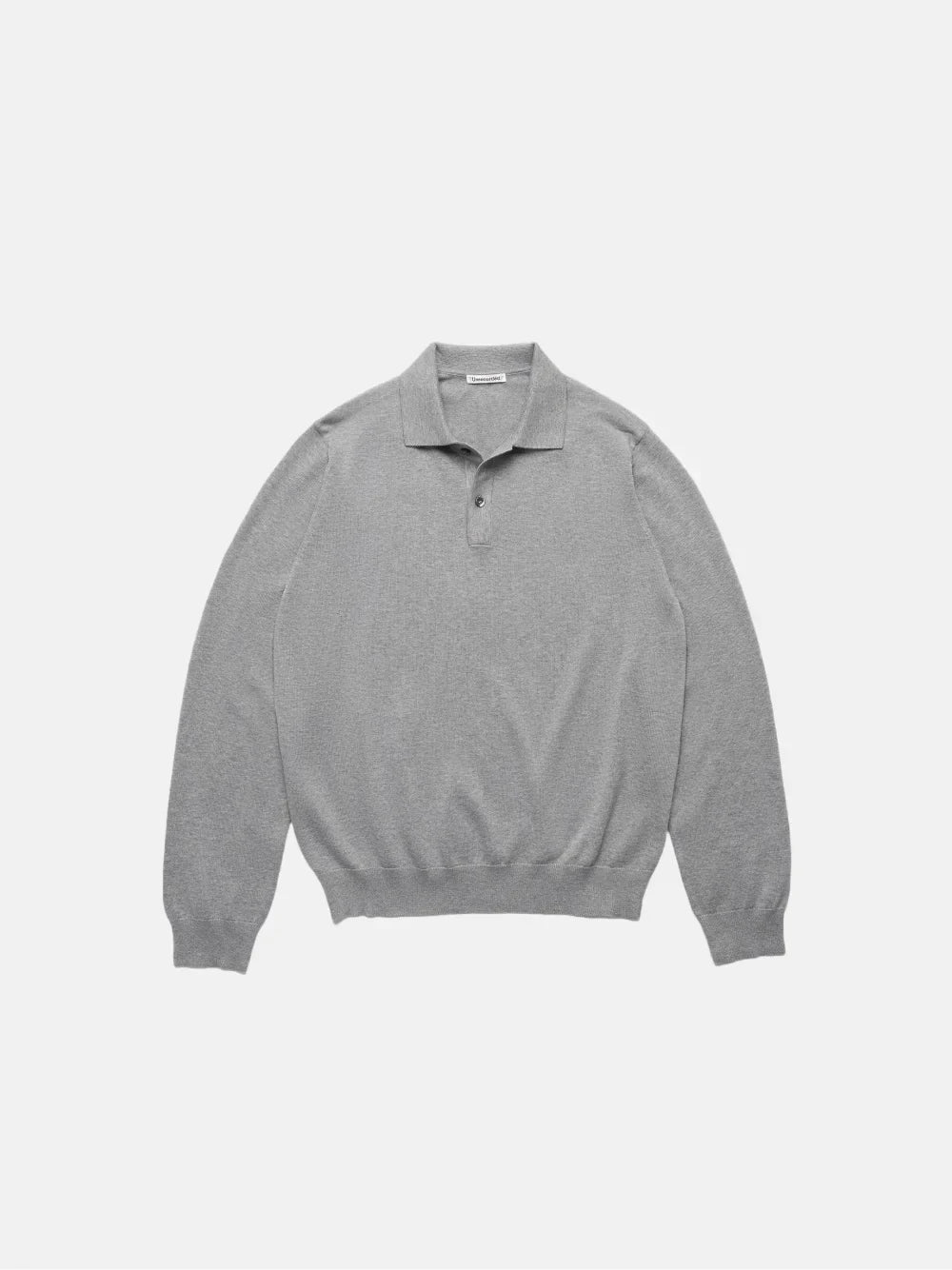 De grijze polo