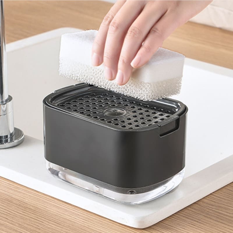 Wasmiddel dispenser en sponshouder voor gootsteen